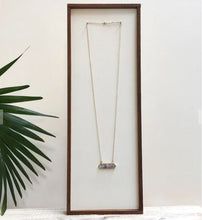 Load image into Gallery viewer, One of our favourites!!  This geometric stone necklace with its gorgeous emerald and purple hues is a work of art all on its own, or layer it and make a statement.  Either way you will definitely get many compliments.  *This necklace is paired with the Boho Necklace  Details:  14k gold plate 30&quot; chain with a 2&quot; extender  Hypoallergenic Nickel/lead free 3 coats anti-tarnish 
