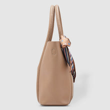 Load image into Gallery viewer, How beautiful is the Baby Panama Handbag? Perfect for day use or a night out, the structured exterior offers a luxurious finish and will be sure to turn heads whenever you are out and about. Features: 1 x Zip Pocket 3 Slip Pockets Internal lining - Suedette Lining External Feature: Removeable Patterned Ribbon Extension strap: 111-125cm Adjustable Detachable Closure: Secure Zip &amp; Magnetic Clasp Material: Vegan Leather Hardware: Light Gold Dimensions: W30 x H23 x D10 cm
