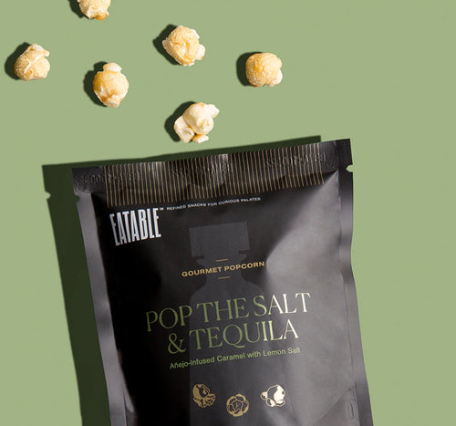 Pop The Salt & Tequilla Infused Gourmet Popcorn (40 gram bag) by EATABLE.  Air-popped, whole grain popcorn coated in a smooth and crunchy Añejo tequila infused caramel and sprinkled with zesty lemon salt. Baked to deliver a satisfying crunch.  A mix of salty and sweet you can't resist.  Makes a great addition to any gift set creation.  Also a perfect travel size for a quick car or plane snack on the go.  **Due to the nature of the product, this item is NON-REFUND