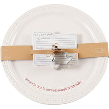 Load image into Gallery viewer, Christmas Cookie Platter 3-piece Set.  The round ceramic plate features a raised beaded rim and debossed sentiment &quot;Friends don&#39;t serve friends fruitcake&quot;.   Makes a perfect holiday or hostess gift - fill it with your favourite cookies for an extra special treat!  Set Includes:  (1) Large Ceramic Platter (1) Metal Tree Cookie Cutter (10) Cardstock Recipe Cards Features:  Ceramic Hand wash Measures 12&quot; diameter 5 lb. capacity
