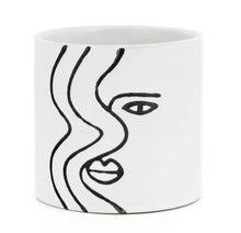 Load image into Gallery viewer, So simple, yet stricking!  This beautiful ceramic planter captures the Face Silhouette so elegantly with its hand-painted design.  It is so versatile it can be used for gorgeous plants, or get creative and use it as a home decor piece on your coffee table or bookshelf.  You can also put it in your office or kitchen for pens, spoons, etc.  Makes a great gift too!  Size:  4&quot; x 4&quot;  Material:  Ceramic
