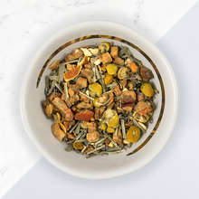 Load image into Gallery viewer, INGREDIENTS: lemongrass, apple bits, vervain, green rooibos, chamomile, lavender, orange pieces, natural flavouring, vanilla bits.
