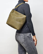 Load image into Gallery viewer, The Charlie Maxi bag is slightly larger then the Charlie bag still with an irresistible boxy shape.  Slip your essentials into the spacious and soft suedette interior or two slip pockets.  Style it your way with your choice of two varying size straps.  The perfect everyday bag.  Features:  2 Flat Pockets 1 Front Side Zip Pocket Internal lining - Suedette Vegan Leather 2 Straps: 50cm &amp; 110cm Closure: Secure Zip Material: Polyurethane PU  Hardware: Light Gold  Dimensions: W33 x H30 x D10.5 cm
